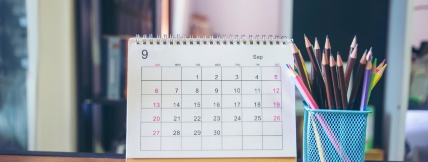 a calendar and pencils