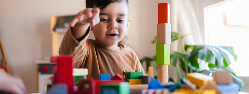 Signs of a Learning Disability in a 3-Year-Old, image of a 3 year old playing with blocks.